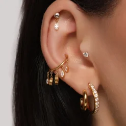 Dangling Conch Piercing | Titan