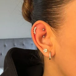Feather Piercing | Titan