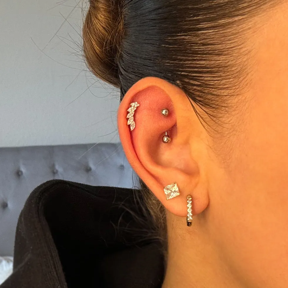 Feather Piercing | Titan